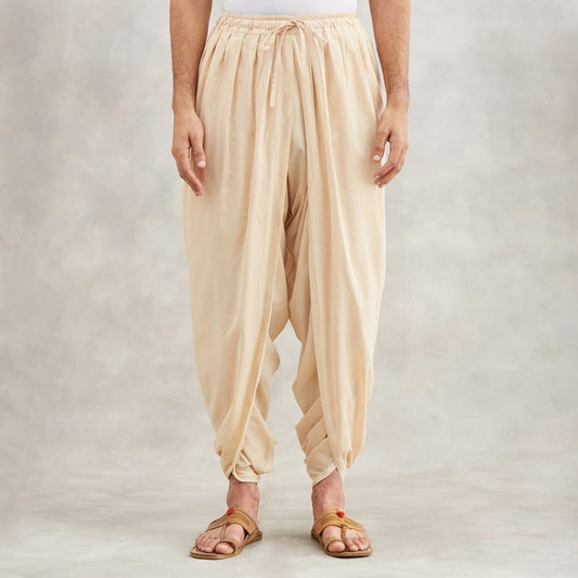 Isha’s signature. Ready to wear Men Dhoti Pants (Beige) / Panchakacham. Organic cotton. Easy to pull on. Versatile. Comfortable for both casual and formal wear.