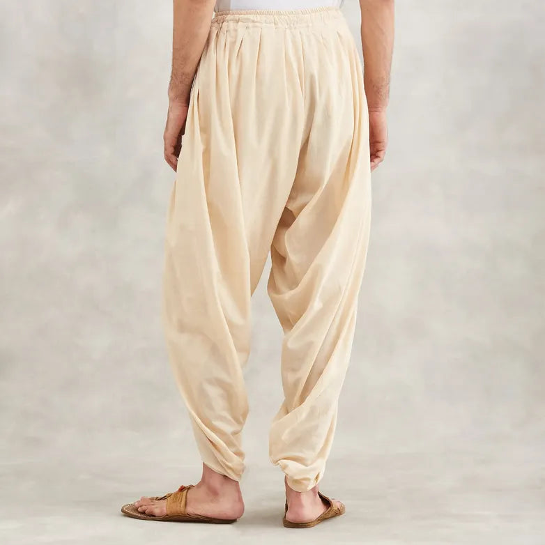 Isha’s signature. Ready to wear Men Dhoti Pants (Beige) / Panchakacham. Organic cotton. Easy to pull on. Versatile. Comfortable for both casual and formal wear.