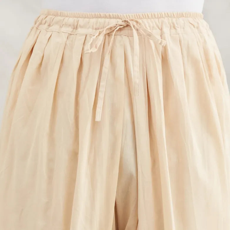 Isha’s signature. Ready to wear Men Dhoti Pants (Beige) / Panchakacham. Organic cotton. Easy to pull on. Versatile. Comfortable for both casual and formal wear.