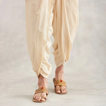 Isha’s signature. Ready to wear Men Dhoti Pants (Beige) / Panchakacham. Organic cotton. Easy to pull on. Versatile. Comfortable for both casual and formal wear.