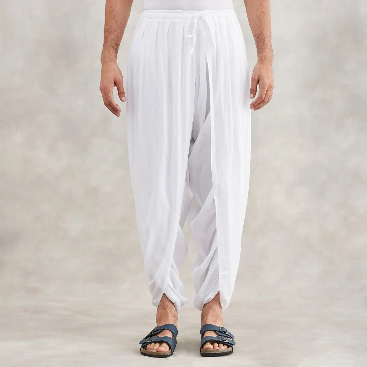 Isha’s signature. Ready to wear Unisex Dhoti Pants (White) / Panchakacham. Easy to pull on. Versatile. Comfortable for both casual and formal wear.