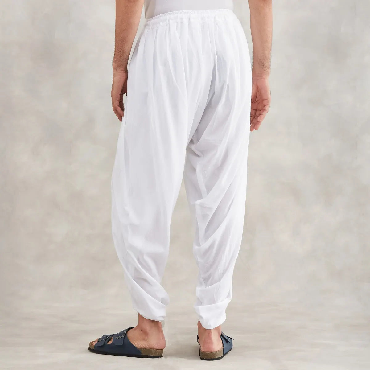 Isha’s signature. Ready to wear Unisex Dhoti Pants (White) / Panchakacham. Easy to pull on. Versatile. Comfortable for both casual and formal wear.