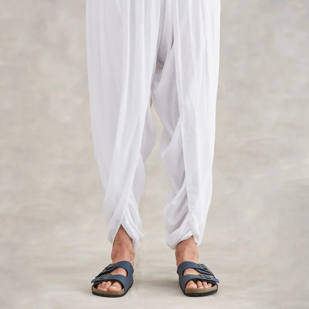 Isha’s signature. Ready to wear Unisex Dhoti Pants (White) / Panchakacham. Easy to pull on. Versatile. Comfortable for both casual and formal wear.